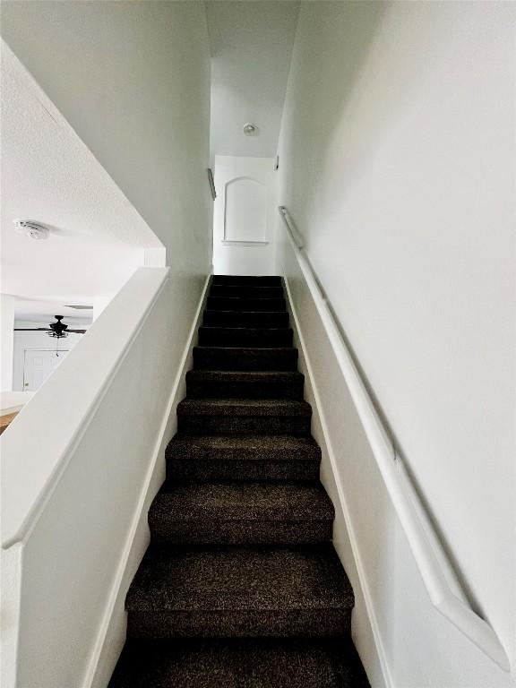 801 Jane Austen Trl Unit B, Pflugerville, TX 78660 - stairs with baseboards and a ceiling fan