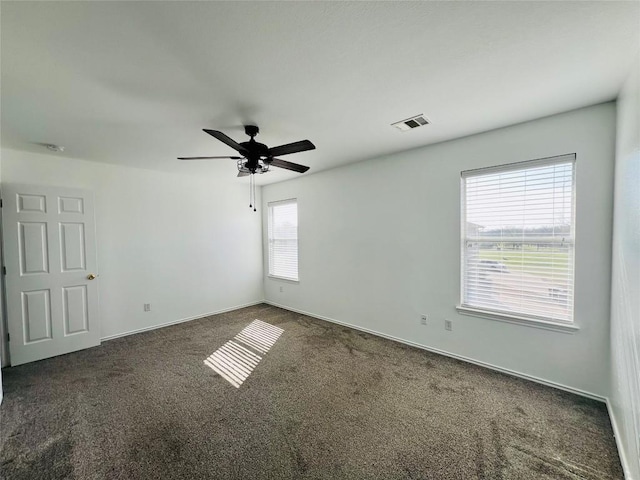 801 Jane Austen Trl Unit B, Pflugerville, TX 78660 - spare room featuring carpet floors and a ceiling fan