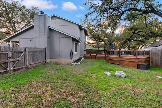 4308 Molokai Dr, Austin, TX 78749 - view of yard with a wooden deck