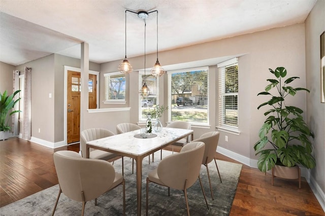 4308 Molokai Dr, Austin, TX 78749 - dining space with baseboards and hardwood / wood-style flooring