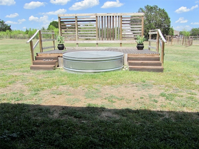 view of yard with a wooden deck