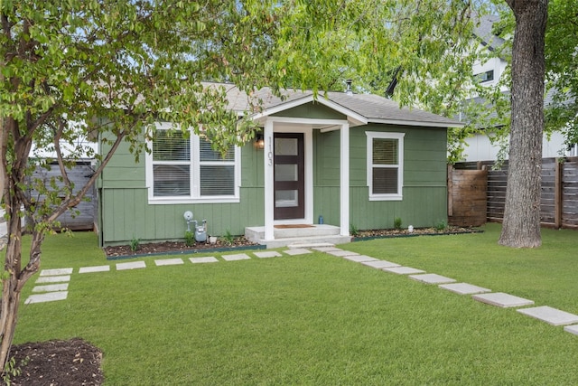 bungalow with a front yard