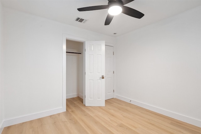 unfurnished bedroom with light hardwood / wood-style flooring and ceiling fan