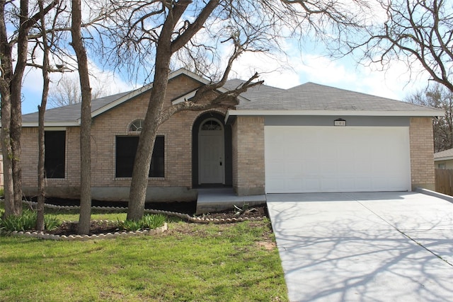 single story home with a front lawn and a garage