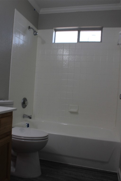 full bathroom featuring vanity, toilet, a healthy amount of sunlight, and tiled shower / bath