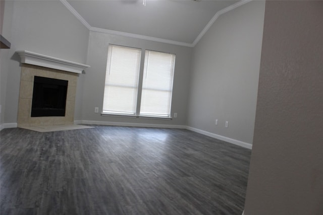 unfurnished living room featuring lofted ceiling, ornamental molding, and dark wood-type flooring