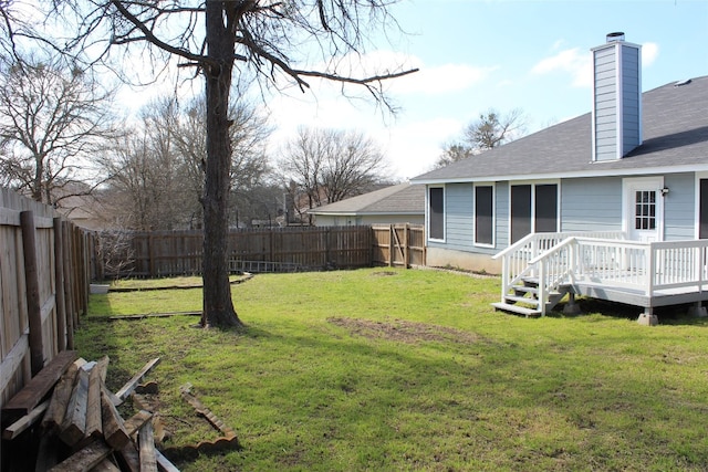 view of yard featuring a deck