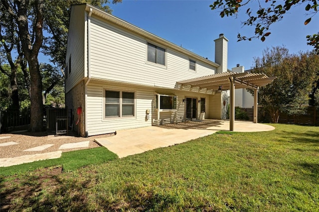 back of house featuring cooling unit, a patio area, a lawn, and a pergola