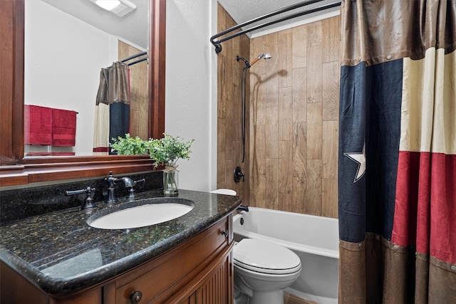 full bathroom with vanity, shower / bath combo, a textured ceiling, and toilet