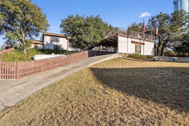 view of yard with a carport