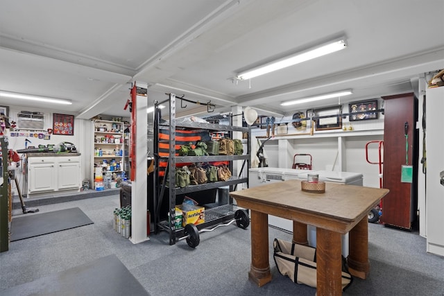 basement with a workshop area