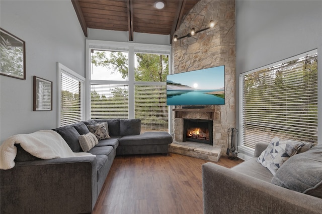 living room with wooden ceiling, hardwood / wood-style flooring, a fireplace, and plenty of natural light