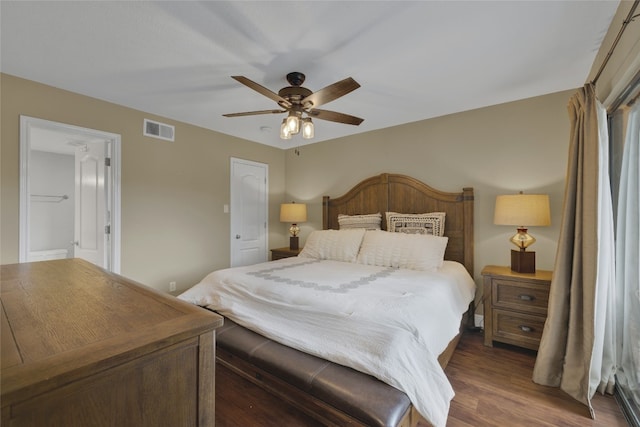 bedroom featuring dark wood-type flooring and ceiling fan