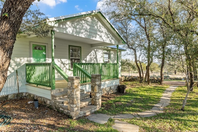 entrance to property with covered porch