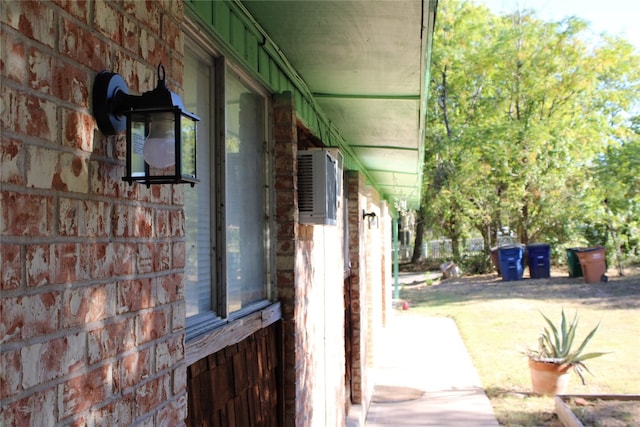 exterior space featuring a wall unit AC