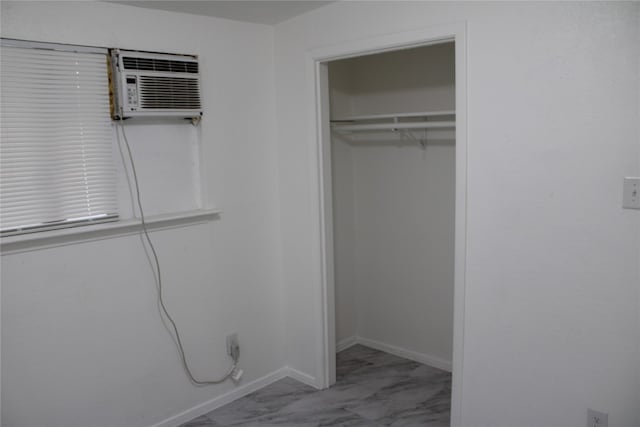 closet with a wall unit AC