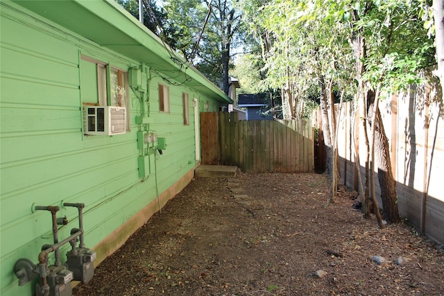 view of property exterior with cooling unit