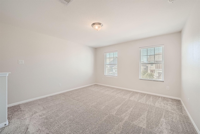 view of carpeted spare room