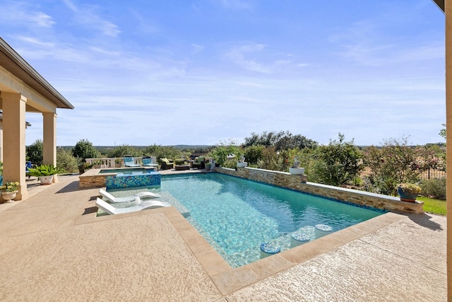 view of pool with a patio