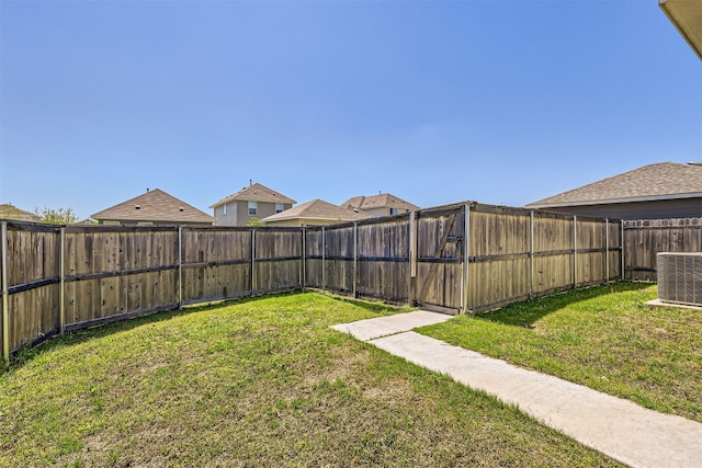 view of yard featuring central AC unit