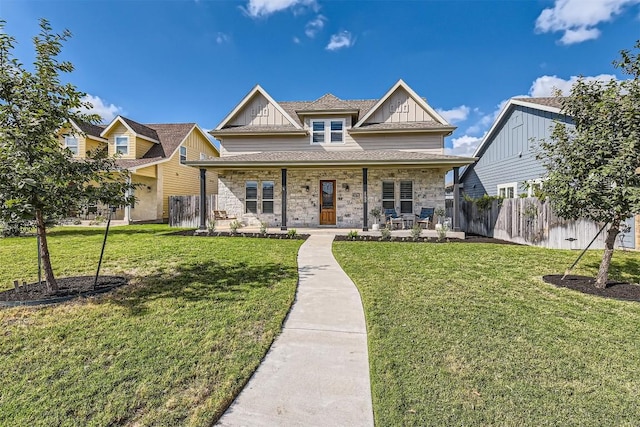 1100 Railroad Ave, Georgetown, TX 78626 - view of front facade featuring a porch, a front lawn, board and batten siding, and fence