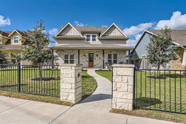 view of front of property with covered porch and a front yard