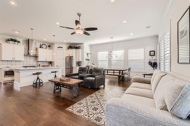 1100 Railroad Ave, Georgetown, TX 78626 - living area featuring dark wood-type flooring, a ceiling fan, visible vents, and recessed lighting