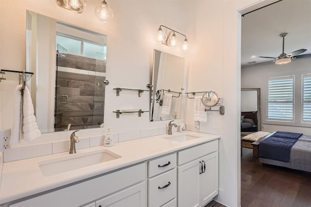 1100 Railroad Ave, Georgetown, TX 78626 - full bath featuring a sink, plenty of natural light, and ensuite bath