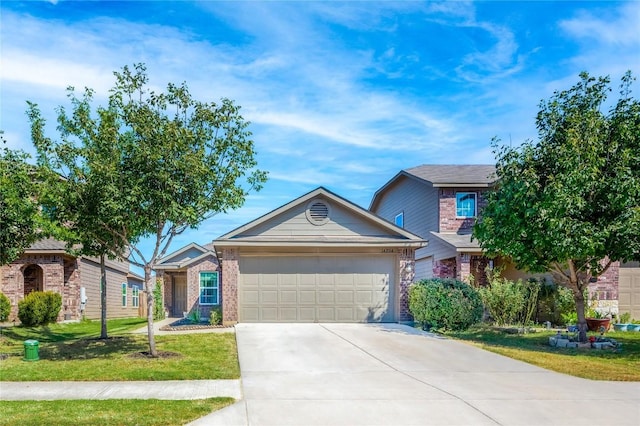 view of front of house featuring a front yard and a garage