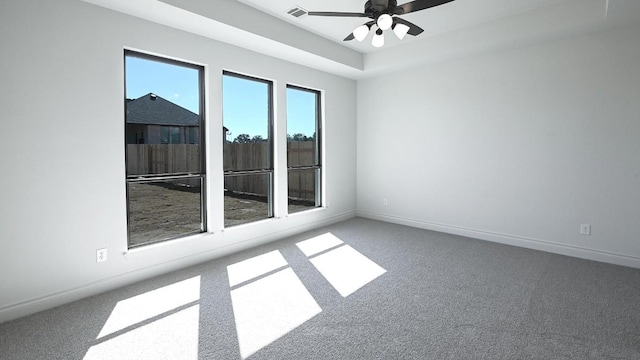 120 Teakmill Trl, San Marcos, TX 78666 - empty room featuring carpet flooring, a ceiling fan, and baseboards