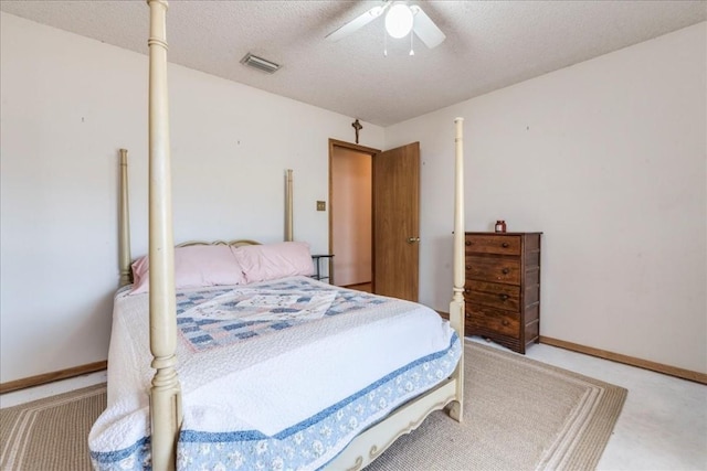 bedroom featuring visible vents, baseboards, light colored carpet, a textured ceiling, and a ceiling fan