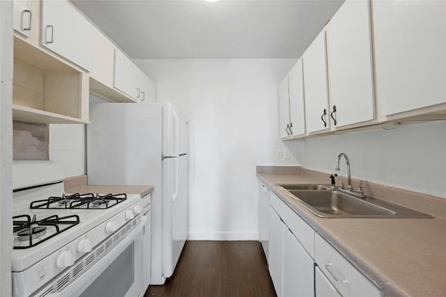 kitchen with white appliances, dark wood-type flooring, sink, and white cabinets