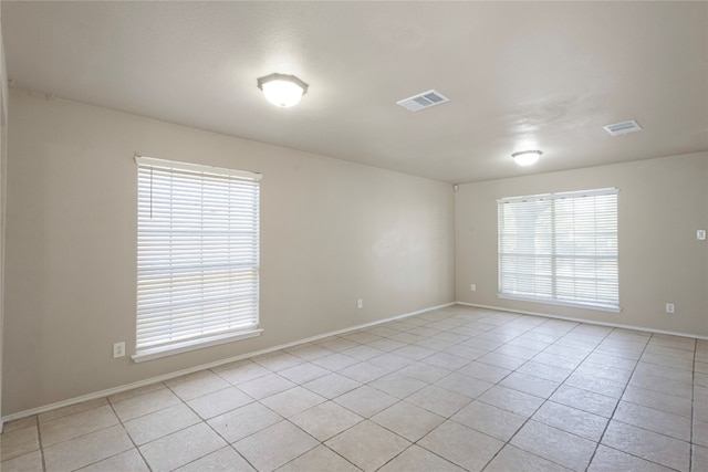 view of tiled empty room