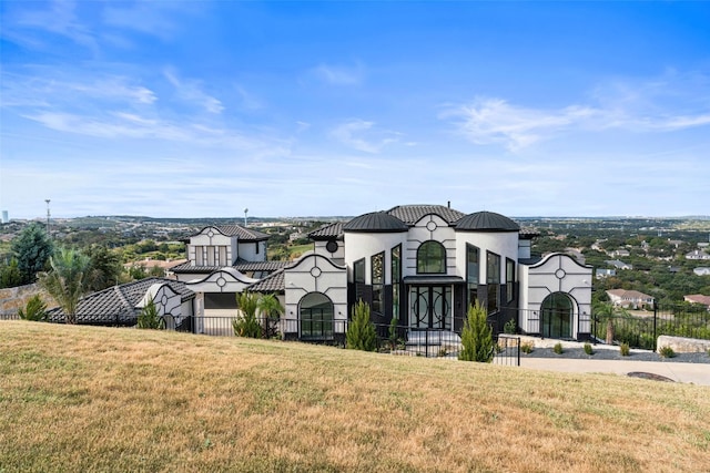 view of front of house with a front lawn