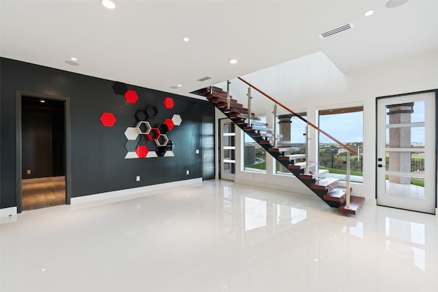 interior space with french doors and tile patterned flooring