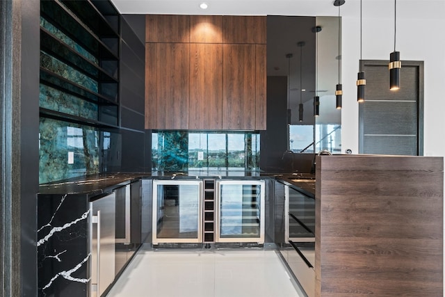 bar with wine cooler, tile patterned floors, and pendant lighting