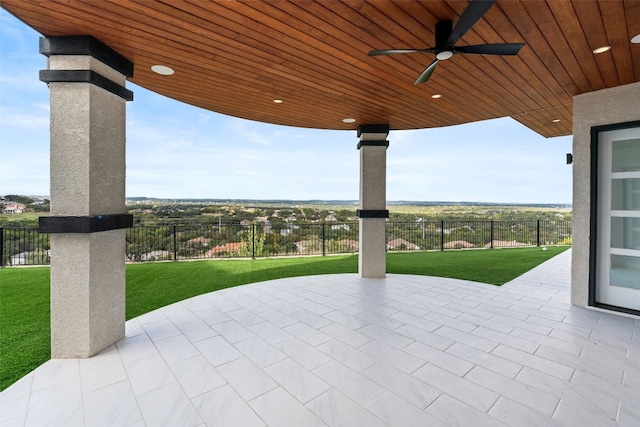 view of patio / terrace featuring ceiling fan