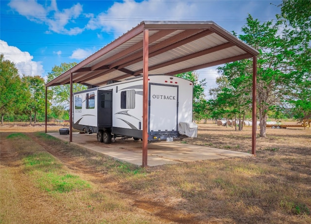 view of patio / terrace featuring a carport