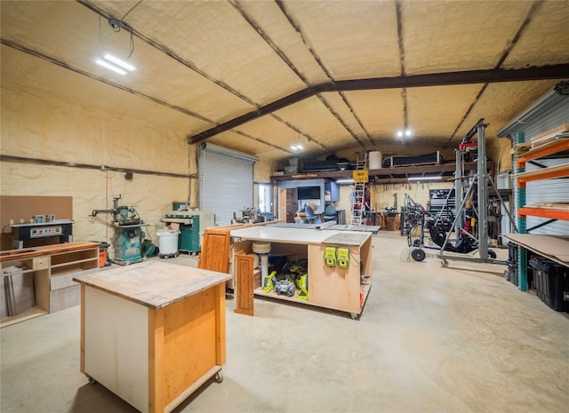 garage with a workshop area