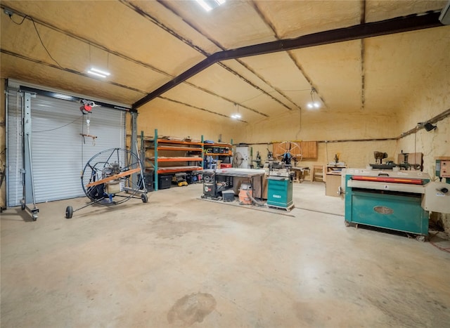 garage with a workshop area