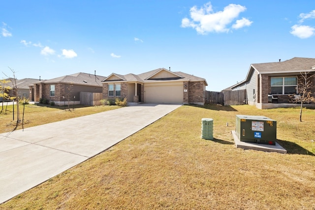 ranch-style house with a garage and a front lawn