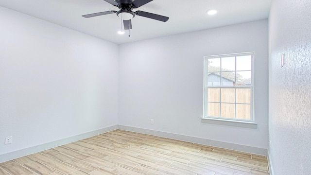 unfurnished room with ceiling fan