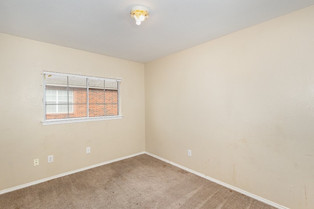 unfurnished room with carpet floors