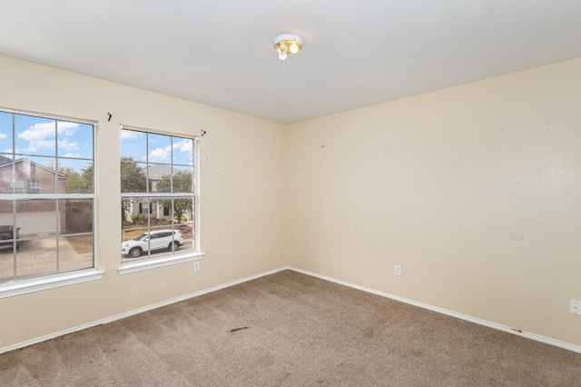 view of carpeted spare room