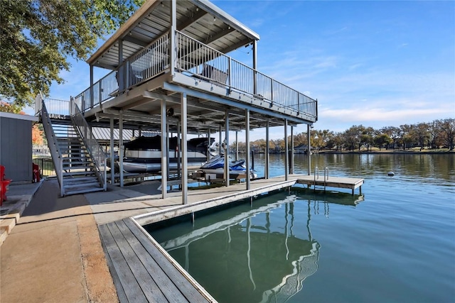 dock area featuring a water view