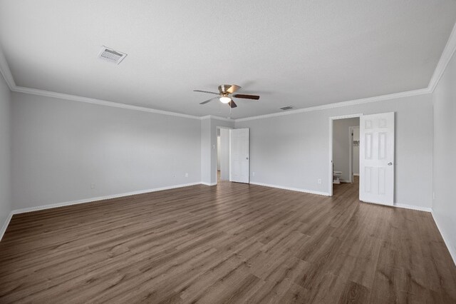 unfurnished room featuring crown molding, ceiling fan, a textured ceiling, and dark hardwood / wood-style flooring