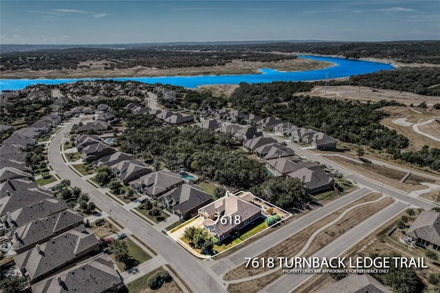 7618 Turnback Ledge Trl, Lago Vista, TX 78645 - aerial view of residential area featuring a nearby body of water