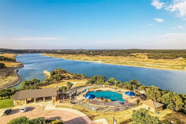 birds eye view of property featuring a water view