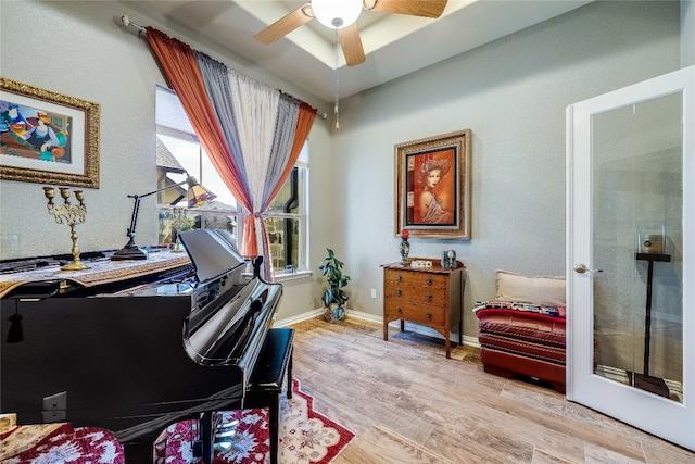 miscellaneous room featuring light hardwood / wood-style flooring and ceiling fan