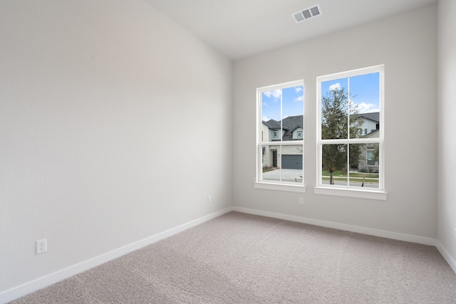 view of carpeted spare room